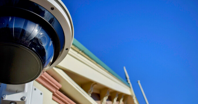 Dome security camera mounted on a heritage building